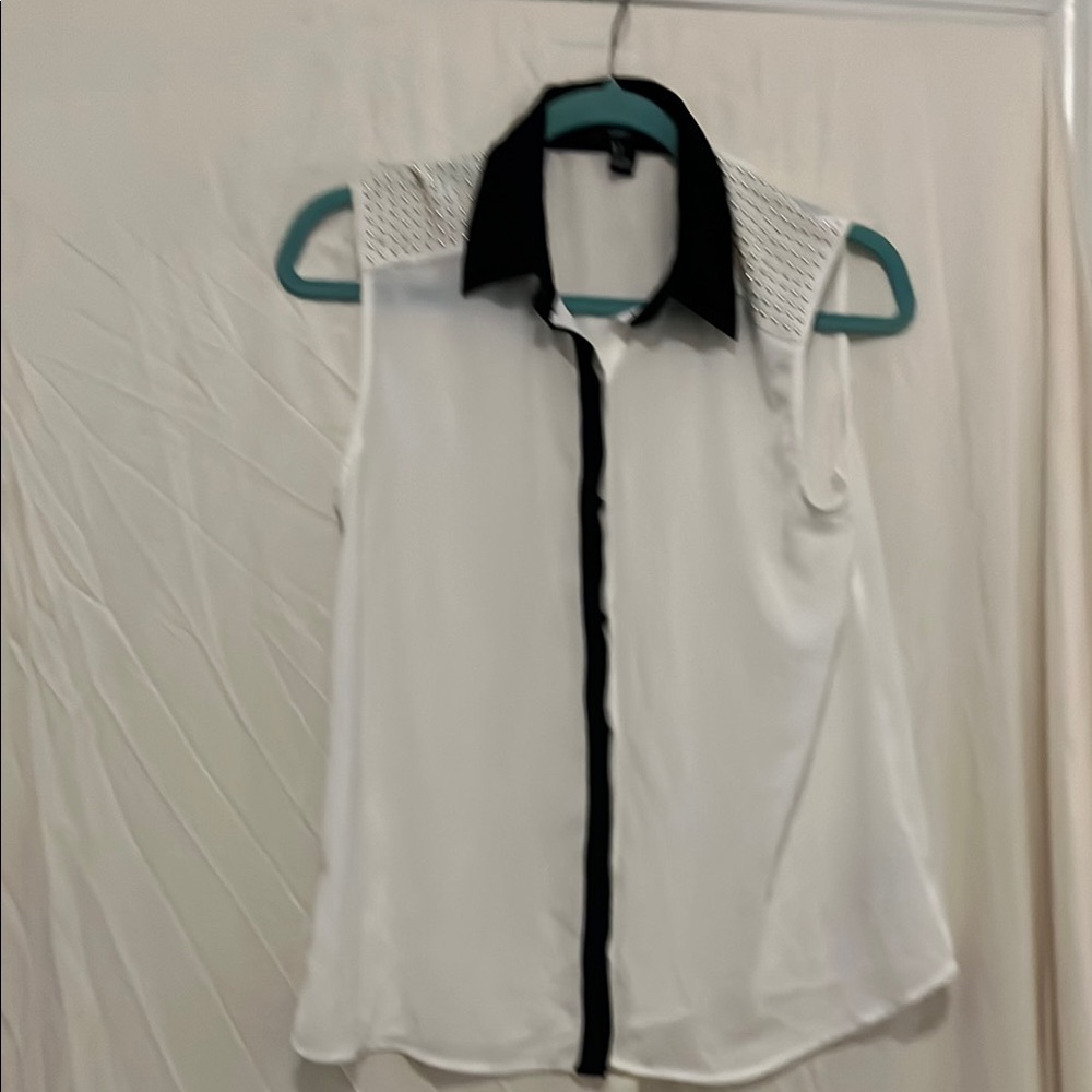 Elegant Black and White Sleeveless Blouse